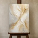 Gilded Veil Gold Abstract Wall Art Canvas Print displayed on a studio easel