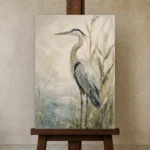 Blue Heron Bird Wall Art Canvas Print displayed on a studio easel