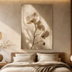 Minimal White Orchid Flower Wall Art Canvas Print showcased in an elegant minimalist interior