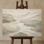 Flowing River Stone Quiet Focus Wall Art Canvas Print displayed on a studio easel