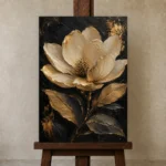 Golden Magnolia Botanical Black & Gold Wall Art Canvas Print displayed on a studio easel