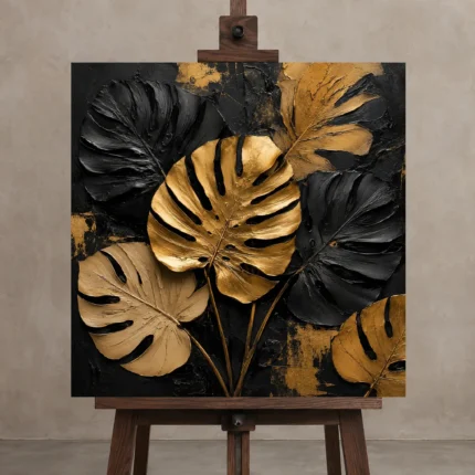 Golden Monstera Botanical Black & Gold Wall Art Canvas Print shown in Studio Easel