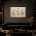 Three Olive Sprigs Olive Branch Wall Art Canvas Print shown in a warm modern interior