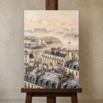 Paris Rooftop Mist Paris Cityscape Wall Art Canvas Print displayed on a studio easel
