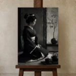 Graphite Chiaroscuro Monochrome Geisha Art Canvas Print displayed on a studio easel