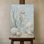 Pale Blue & Aqua Seahorse Coastal Kids Wall Art Canvas Print displayed on a studio easel