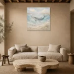 Pale Blue Baby Whale Coastal Kids Wall Art Canvas Print presented in a sophisticated home setting