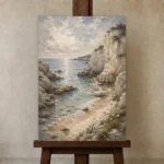 Blue Gray Secluded Cove Coastal Landscape Wall Art Canvas Print displayed on a studio easel