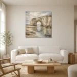 Blue Gray Sea Arch Coastal Landscape Wall Art Canvas Print styled in a refined neutral interior