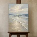 Pearl Surf Coastal Living Room Wall Art Canvas Print displayed on a studio easel