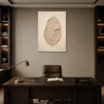 Sculptural Clay Oval Minimalist Wall Art Canvas Print displayed in a contemporary gallery-inspired room