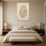 Sculptural Clay Oval Minimalist Wall Art Canvas Print showcased in an elegant minimalist interior