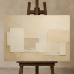 Warm Neutral Rectangles Minimalist Wall Art Canvas Print displayed on a studio easel