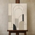 Ivory Architectural Minimalist Wall Art Canvas Print displayed on a studio easel
