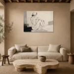 Ivory Seated Figure Minimalist Wall Art Canvas Print presented in a sophisticated home setting