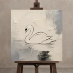 Ivory Swan Minimalist Wall Art Canvas Print displayed on a studio easel