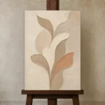 Warm Petal Forms Minimalist Wall Art Canvas Print displayed on a studio easel