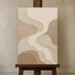 Tranquil Tide Forms Minimalist Wall Art Canvas Print displayed on a studio easel