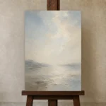 Misty Horizon Minimalist Wall Art Canvas Print displayed on a studio easel