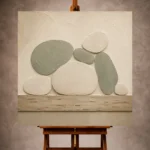 Sage and ivory Minimalist Wall Art print featuring pebble-like organic forms and a weathered wood band for elegant interiors