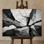 Abstract Tectonic Layers Monochrome Wall Art Canvas Print displayed on a studio easel