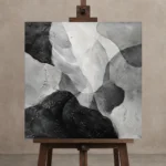 Layered Organic Forms Monochrome Wall Art Canvas Print displayed on a studio easel