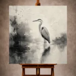 Black and ivory Ink Wash Wall Art print featuring a solitary heron standing in reflective water for elegant interiors