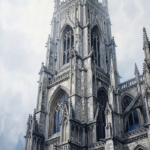 Silver and cobalt black and white architectural prints featuring a Gothic cathedral tower
